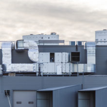 Large, roof-based commercial air conditioning units.